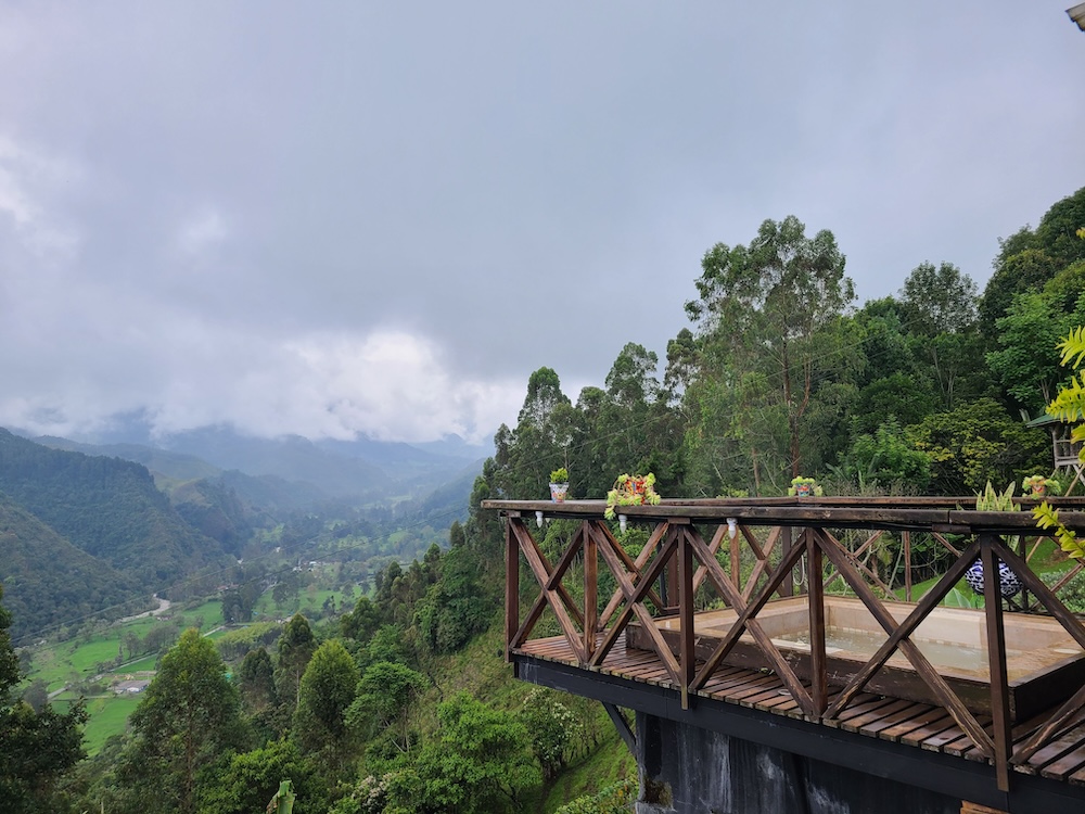 The jacuzzi and views from Kawa Mountain Hotel